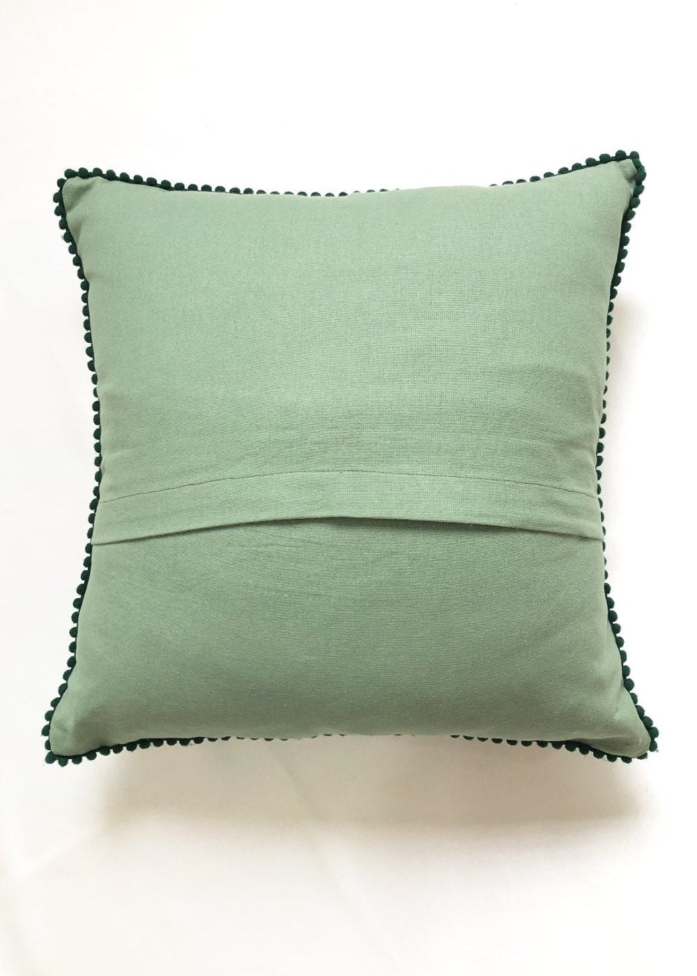 Solid green cotton cushion cover with a smooth finish. Minimalist design with a flap closure.