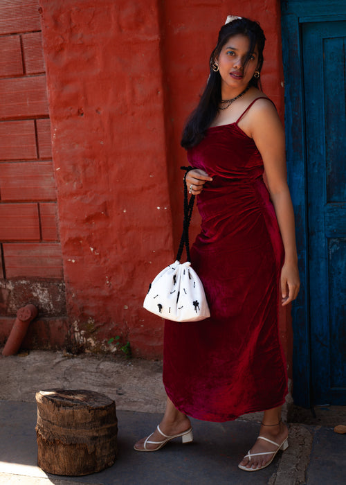 Deep Red velvet Berry Blush slip dress with V neckline, spaghetti straps, and side gathered detail.