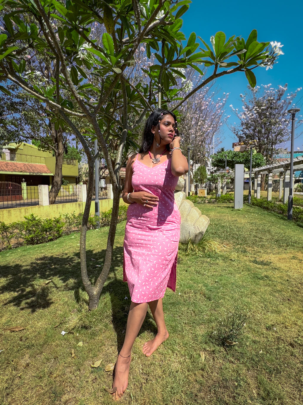 Printed Cotton-Linen flamingo pink knee length Slip dress with V neckline, spaghetti straps, side slits, and pockets.