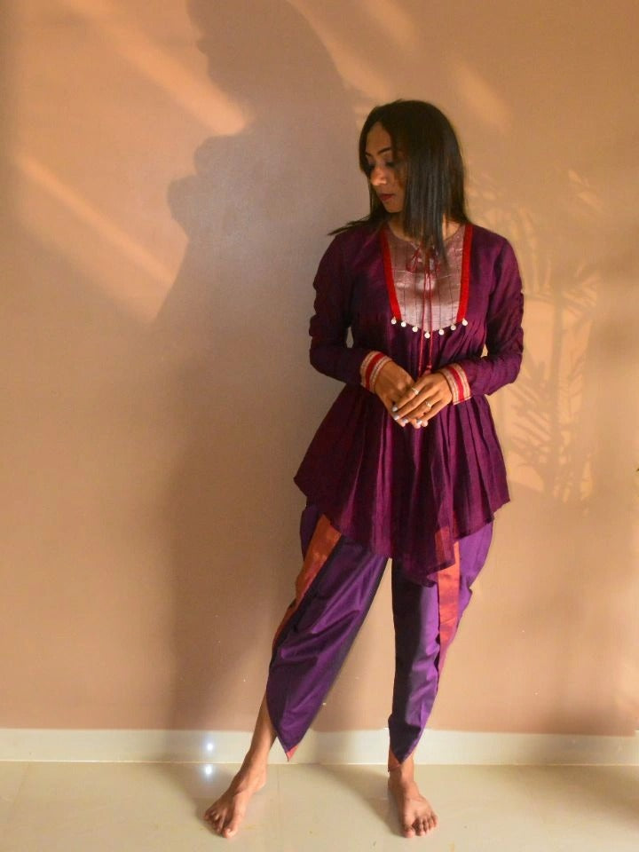 Purple stripe cotton Jamini Tunic with silver yoke, tassel tie-up neckline, ruched sleeves, and dhoti pants styled for a festive look.