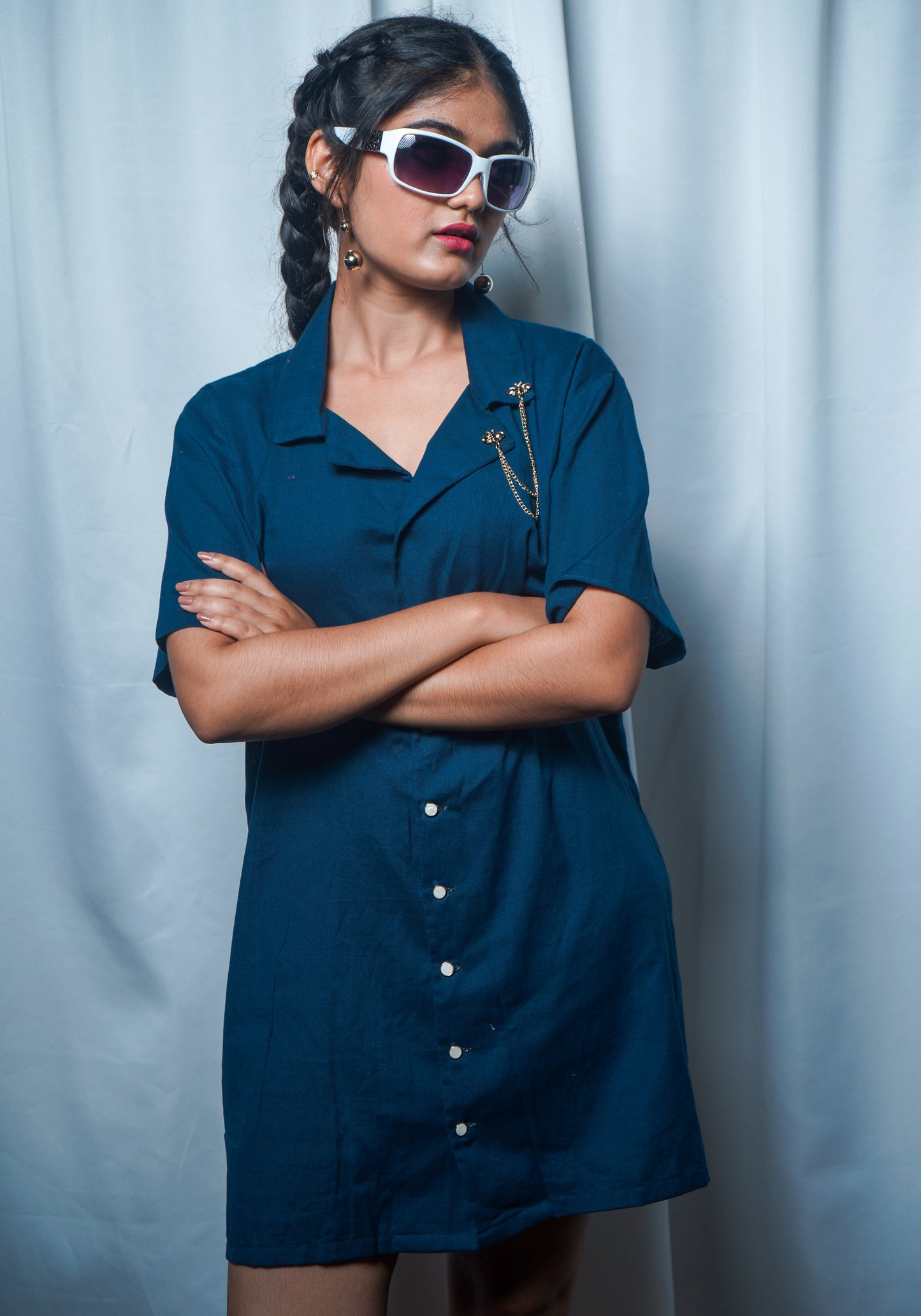Teal blue cotton linen shirt dress with  resort collar styled for a casual look.